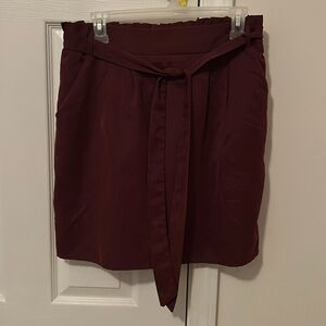 Maroon skirt with tie and pockets